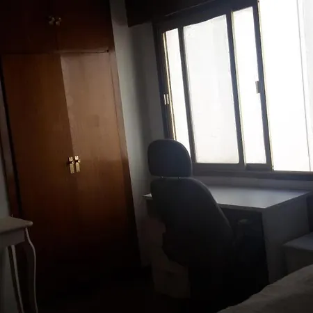 Quarto em Acomodações Particulares Amplias En El Centro De