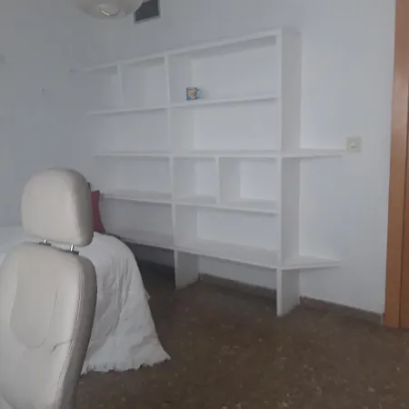 Quarto em Acomodações Particulares Amplias En El Centro De *